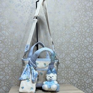 Madden Girl Cream and Light Blue Crossbody Tote with Bear Charm
